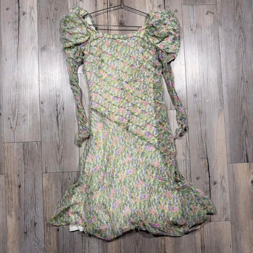 Vtg Judy Hornby Couture dress  features dramatic puffed sleeves